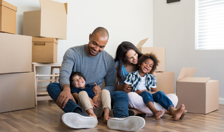 family with moving boxes