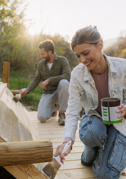 Couple working on new deck